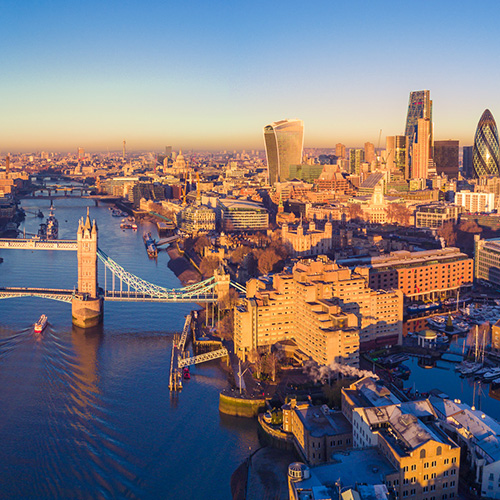 An aerial view of the city of London and the Thames River.