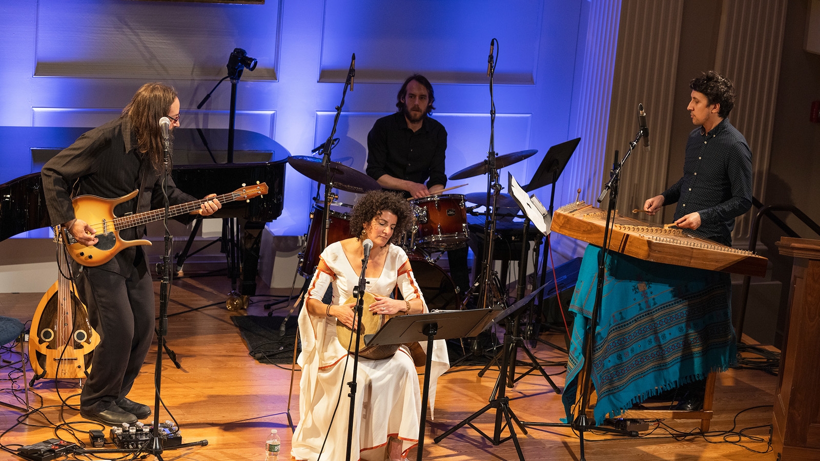 Galeet Dardashti and musicians playing instruments and performing. 